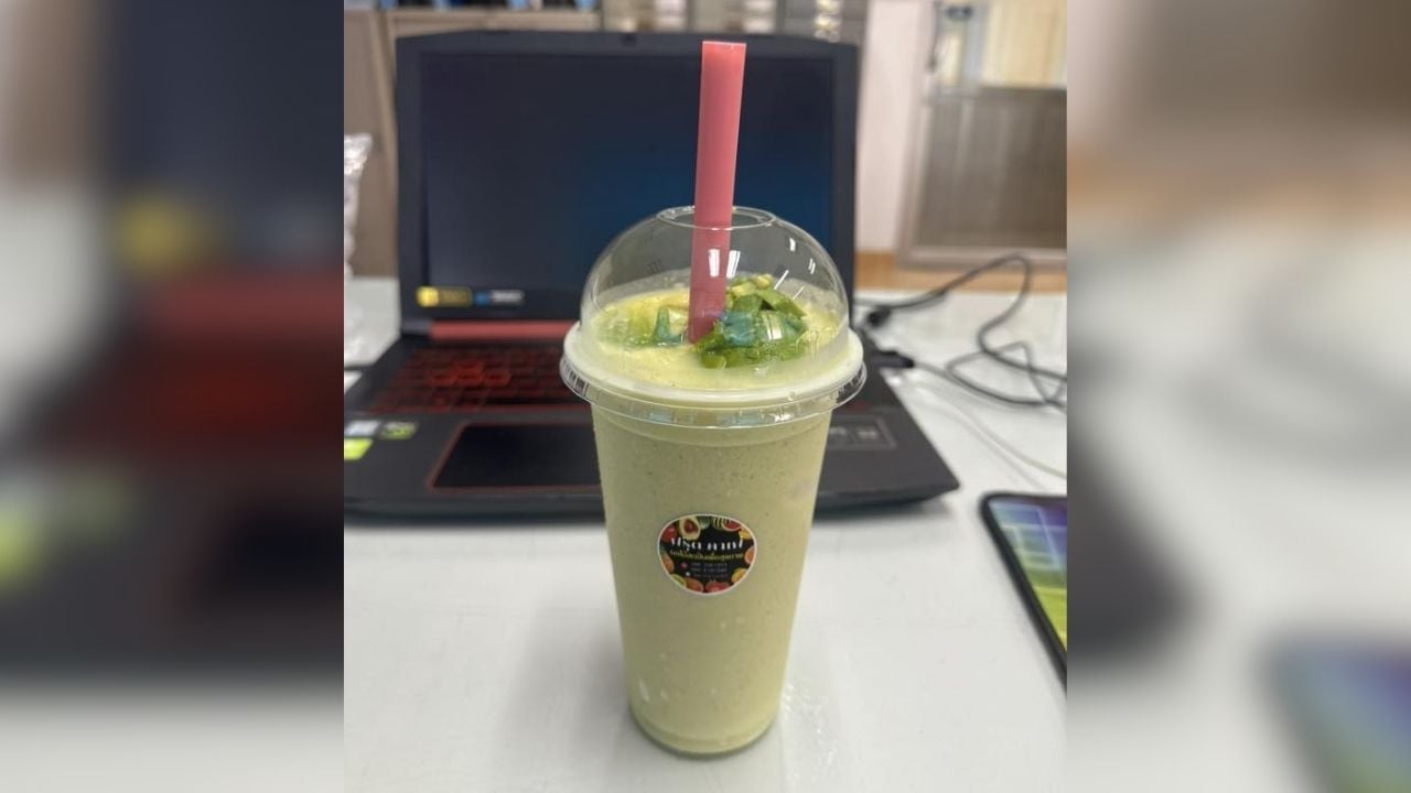 Avocado smoothie blended with green chicken curry