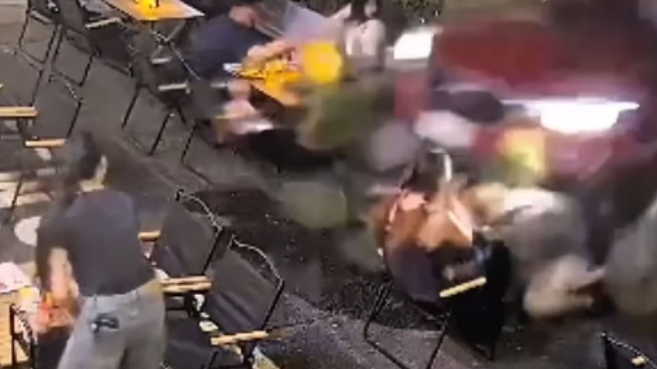 Thai woman crahses car into restaurant nearly run over foreigners