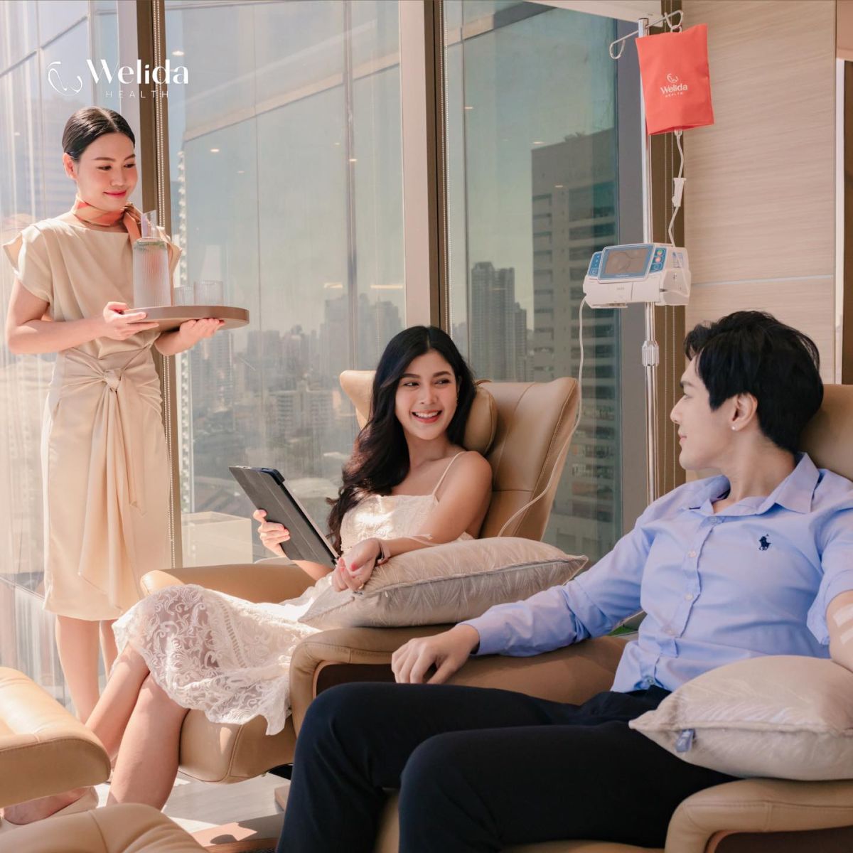 A man and woman getting IV Drip at Welida Health Bangkok