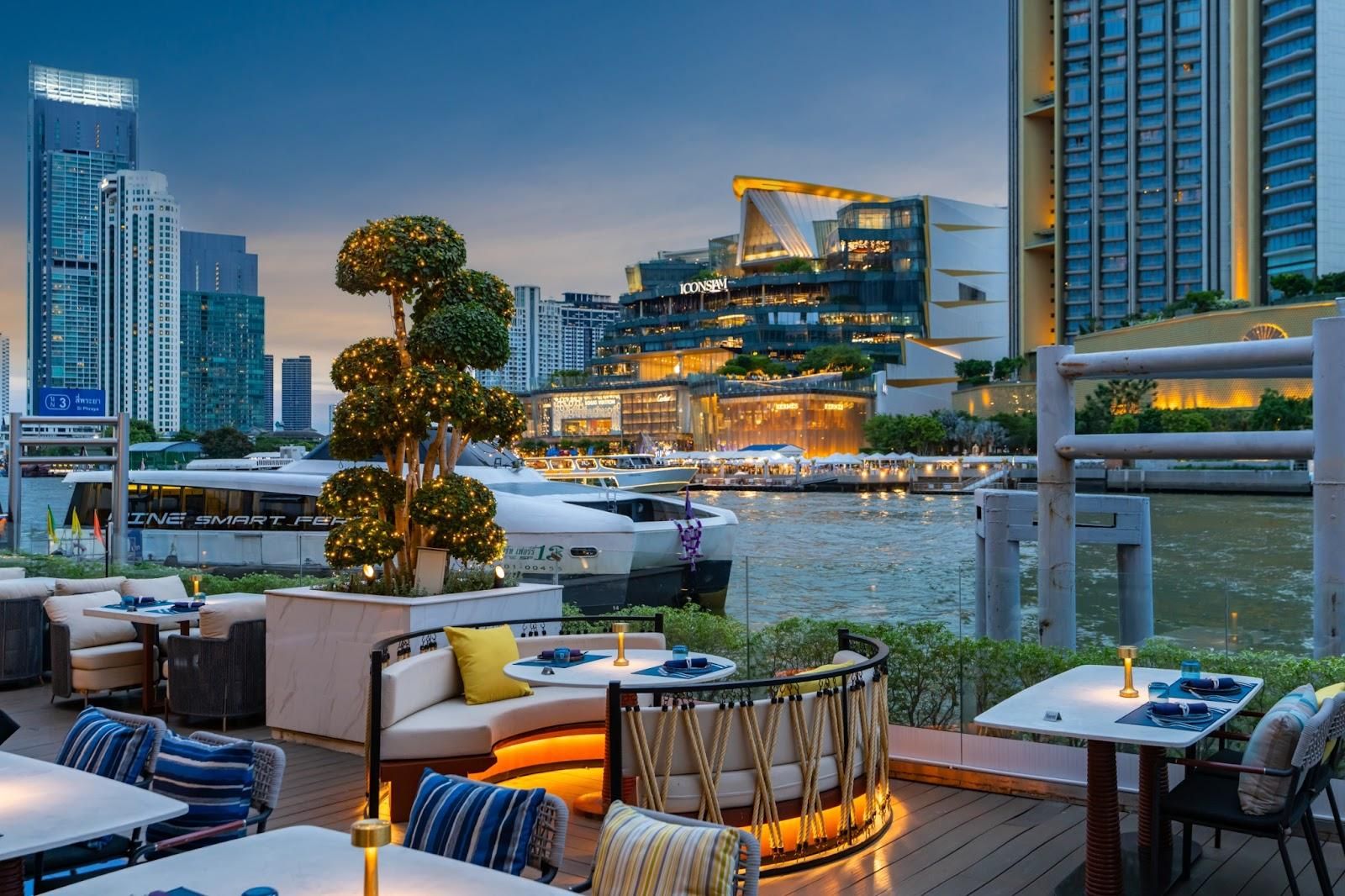 Siam Yacht Club allows you to eat and drink right by the Chao Phraya River