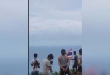 Film crew blasted for rolling up Thai flag at Phuket viewpoint (video) | Thaiger