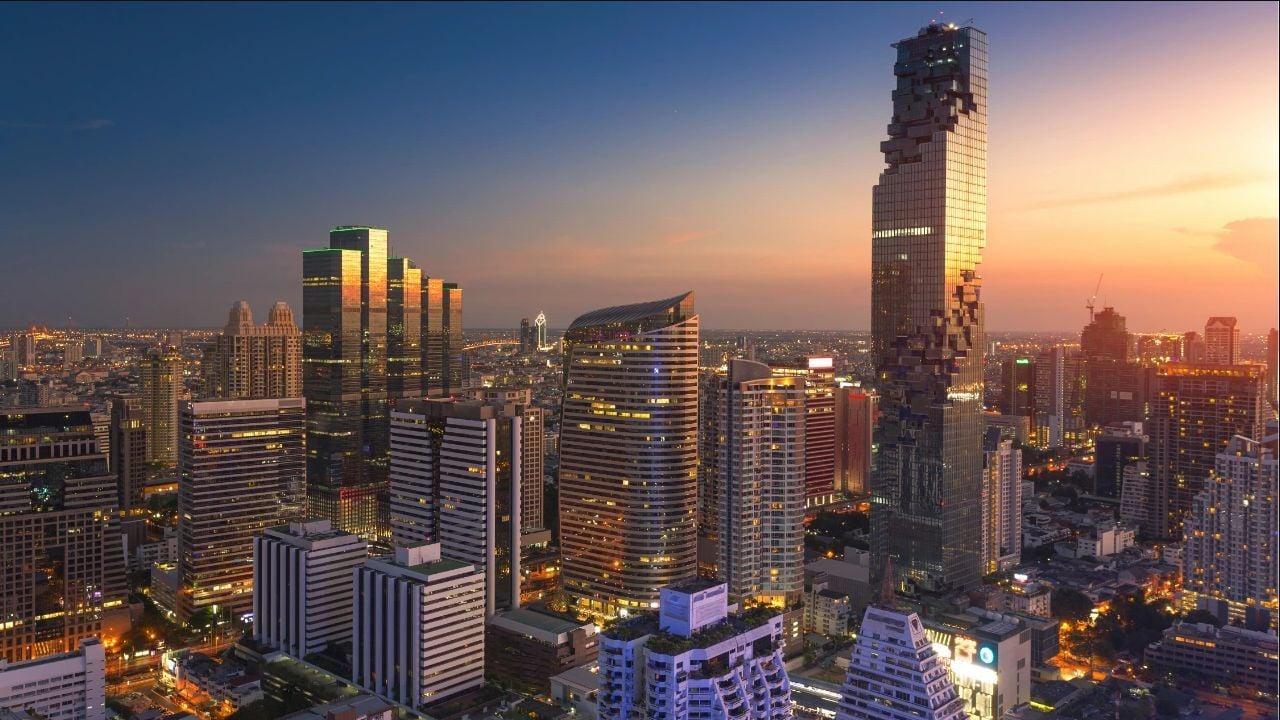 MahaNakhon tower and Bangkok skyline featuring modern 1-bedroom condominiums.