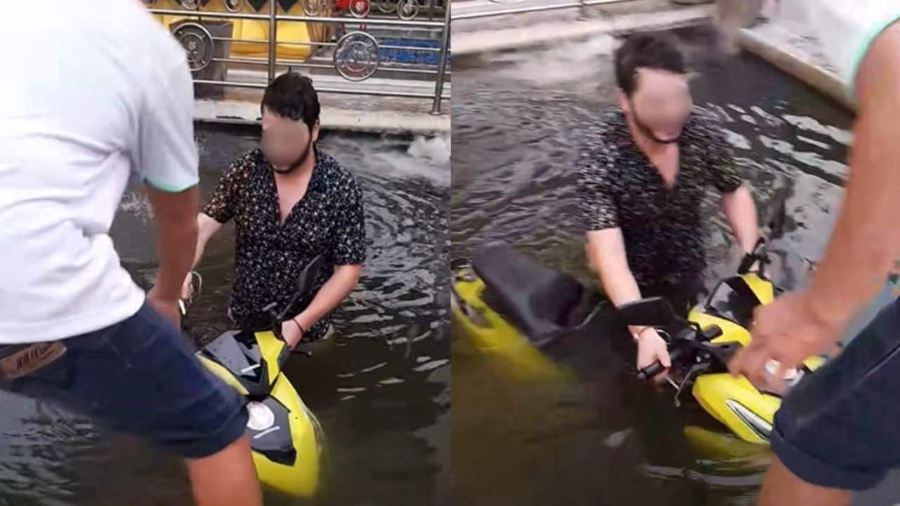 Foreign man rides motorcycle into pond in Pattaya