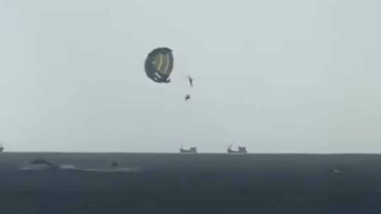 Brave parasailing assistant jumps into sea to save tourist off Phuket beach | Thaiger