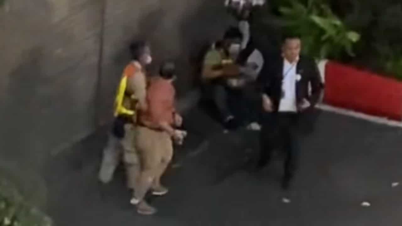 Altercation over taxi drop-off spot