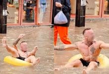 Foreign man goes viral for swimming in floodwater on Bangla Road, Phuket | Thaiger