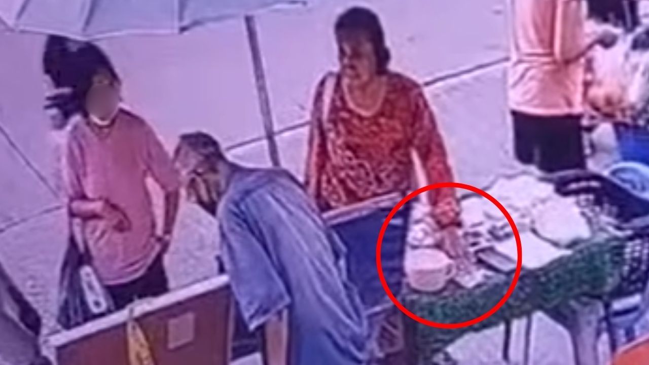 Woman caught on CCTV stealing 7,500 baht from lottery shop | Thaiger