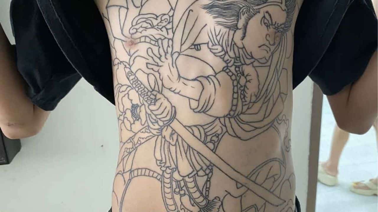 Kanchanaburi tattoo shop removes child's offensive tattoo for free | News by Thaiger