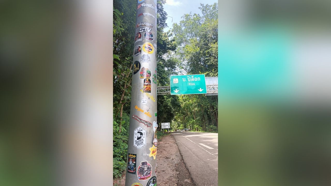 Tourists face fines for defacing Kanchanaburi road sign | Thaiger