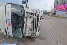 Delivery truck flips on wet Sri Racha road, driver injured | Thaiger