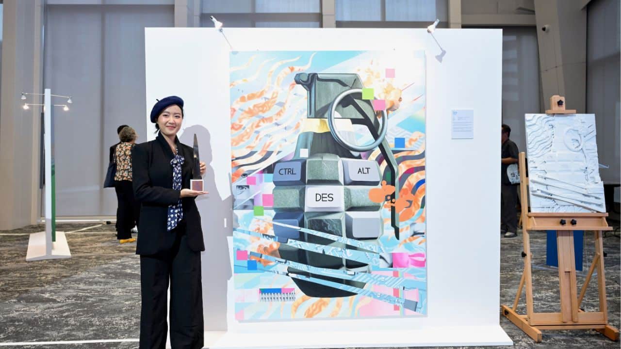 Tanyapat Manasarakul with her artpiece, Ctrl + Alt + Destruct