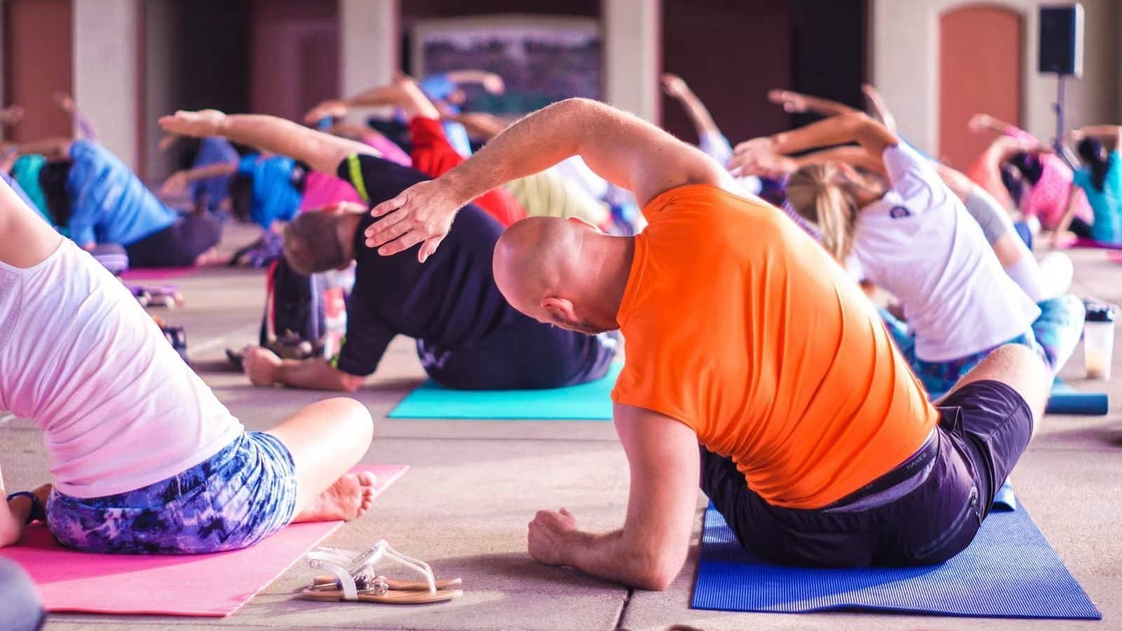 People doing yoga in a room