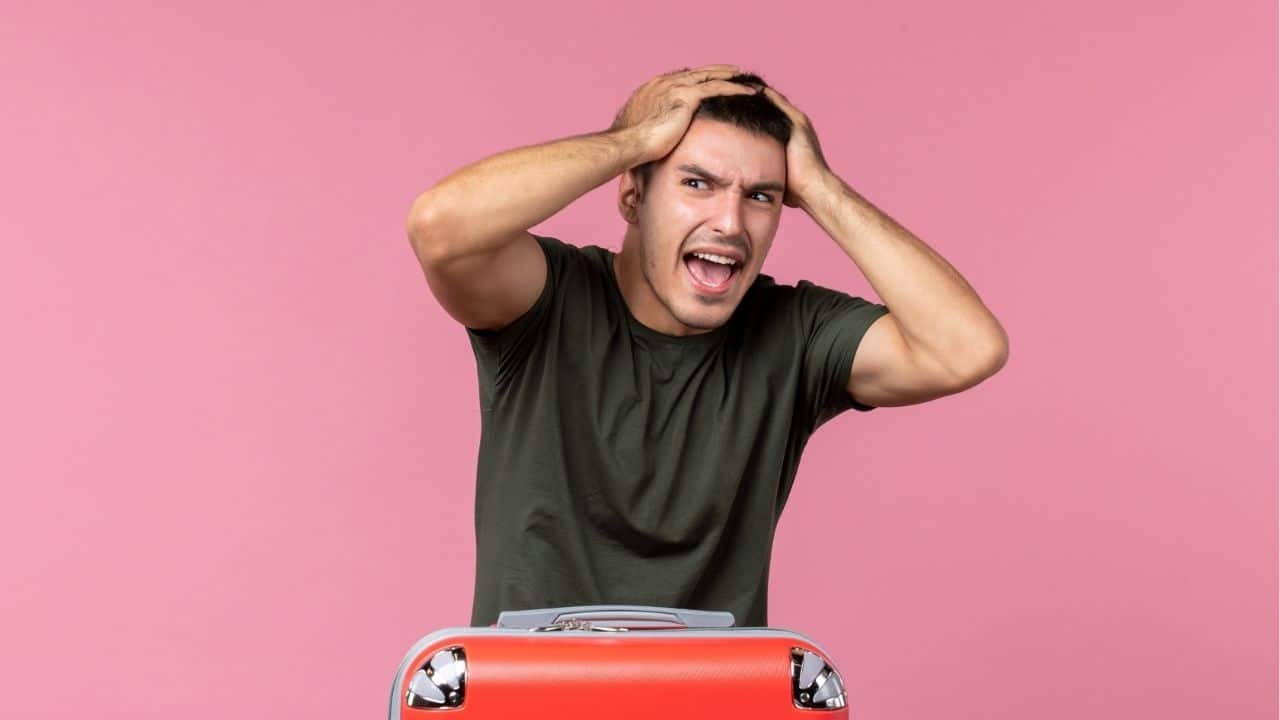 A traveller encounters a TDAC scam website charging fees for a free service.