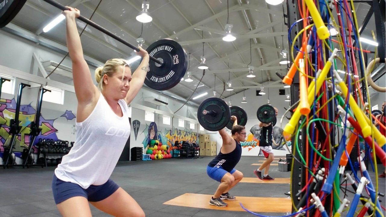 Fitness enthusiasts engaging in a CrossFit session on the island.
