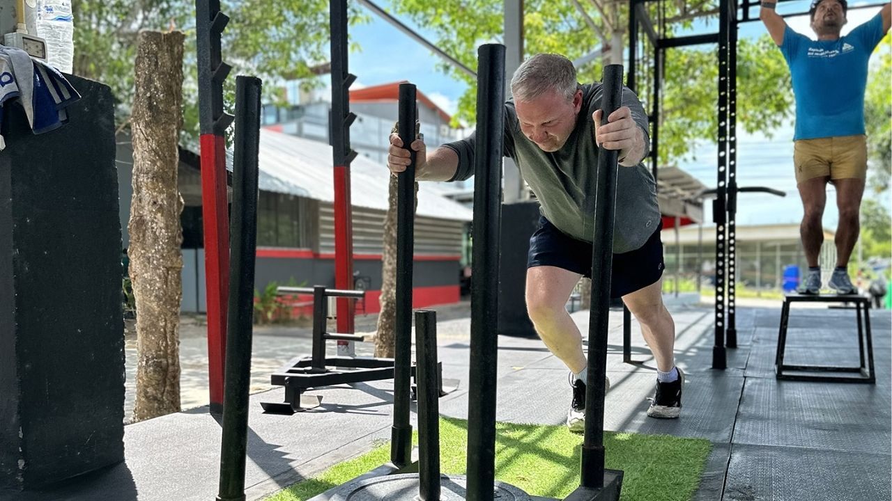 A group of expats participating in a fitness boot camp in Phuket.