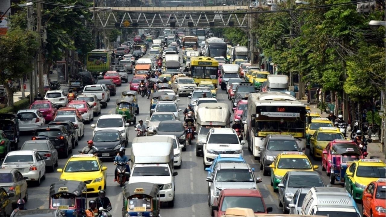 Traffic congestion on Thailand's toll road during peak hours near Bangkok.