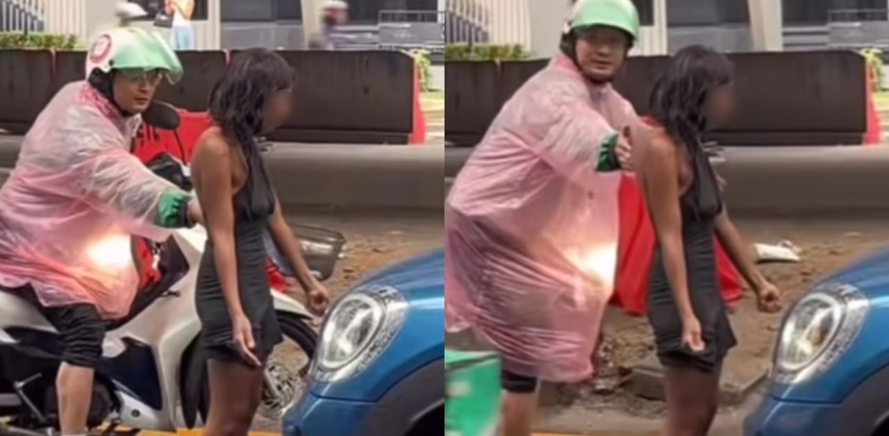 American woman blocks Bangkok road