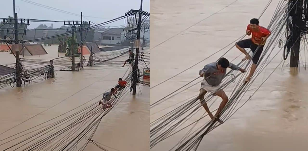 Viral video shows Thai men risking lives on wires during severe Hat Yai flood | Thaiger