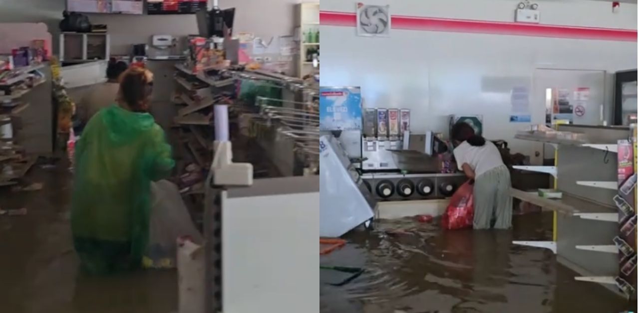 Hat Yai locals takes goods from convenience store damaged in floods