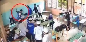 Thai man at large after attacking and threatening boy with gun at school | Thaiger