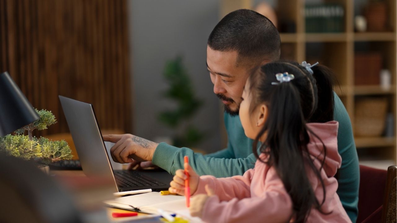 A child studying with various educational materials in Thailand.