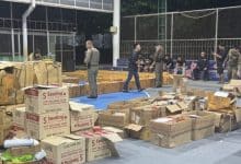 Phuket warehouse raid uncovers scam with 20,000 items seized | Thaiger