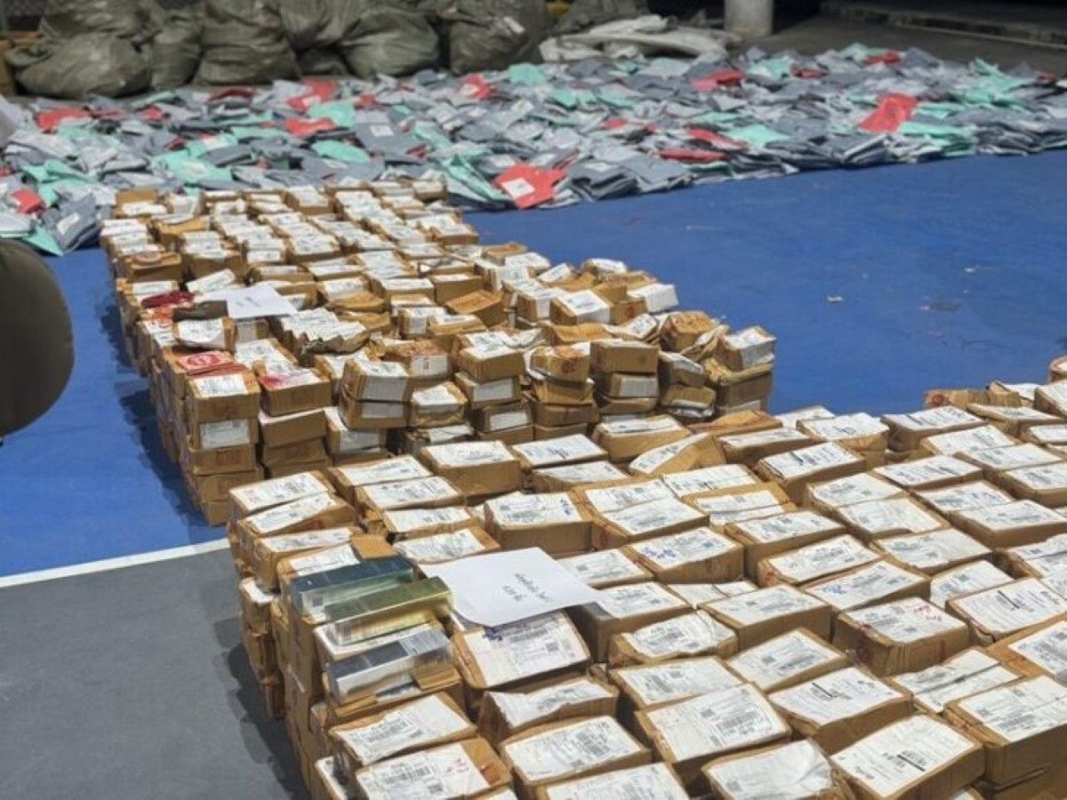 Police raid in Phuket uncovers a large-scale scam operation with over 20,000 items seized.