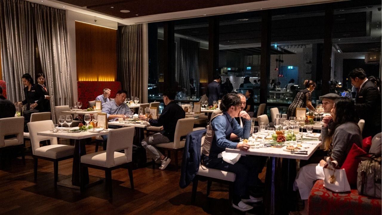 Guests enjoy a luxurious dining experience at The St. Regis Bangkok's signature restaurant, VIU.