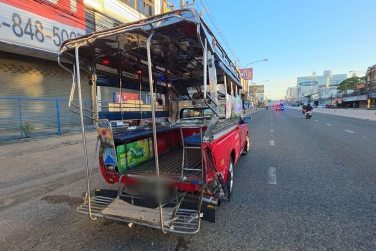 A red songthaew with its rear end crushed after being hit by a pickup truck in Chon Buri on December 15.