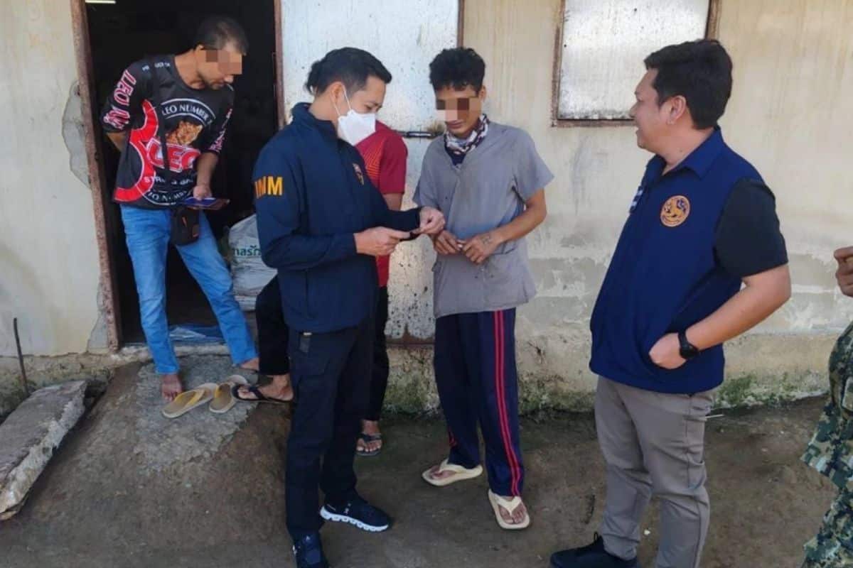 Immigration officers arrest foreign nationals during a year-end crackdown in Nakhon Pathom.