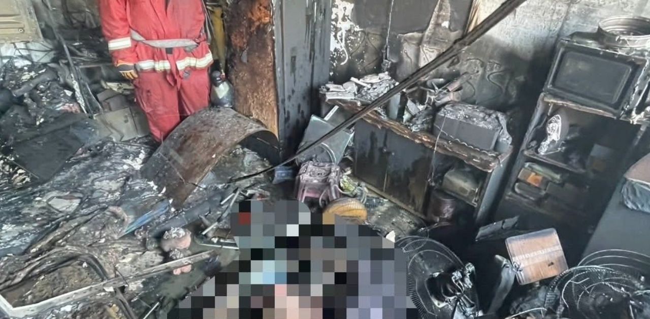 Thai mother embraces two children in Samut Sakhon building fire