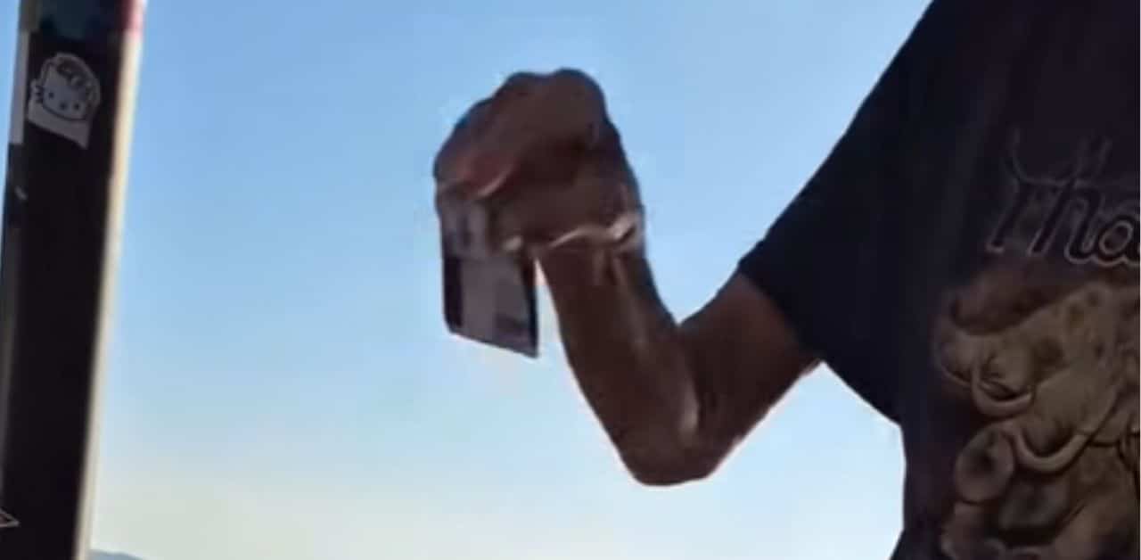 Foeign man takes public space for personal business