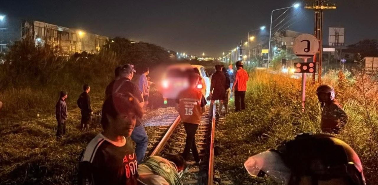 Thai man saved after driving on railway tracks