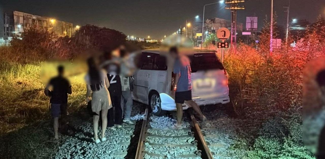 Thai man narrowly escapes death after driving along Pattaya railway track