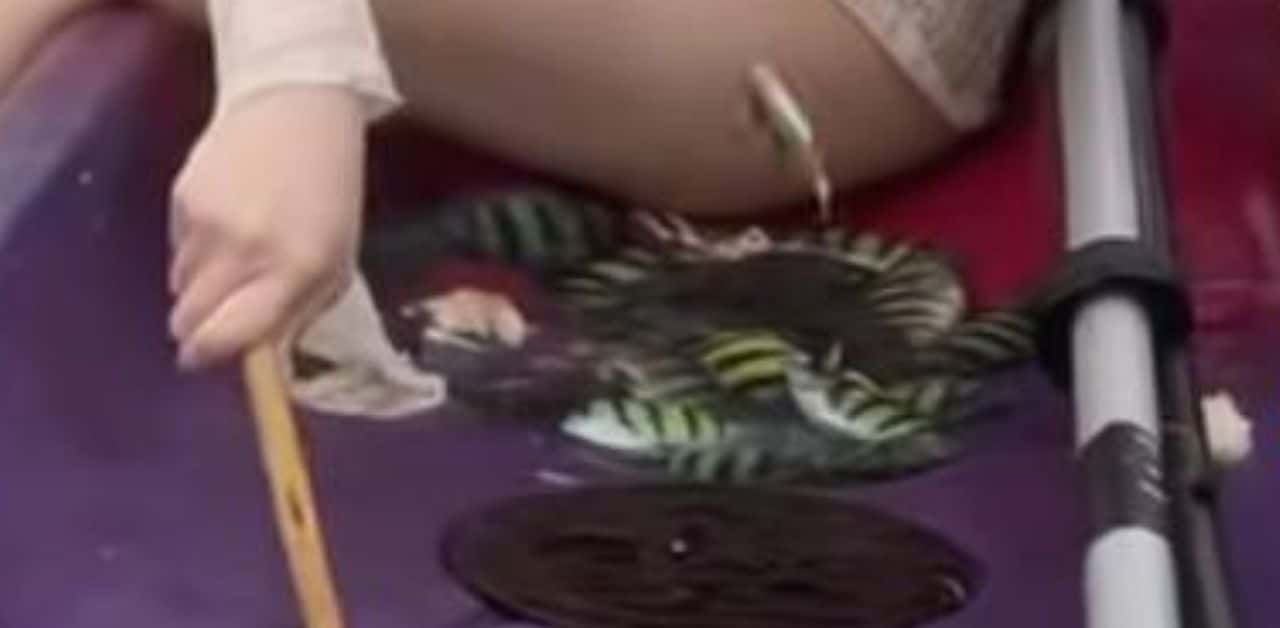 Chinese woman fishing for fun Phuket sea