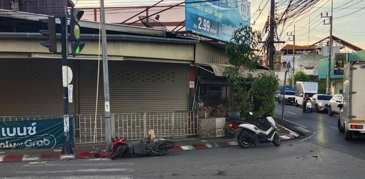 Foreign motorcyclist runs red light and crashes