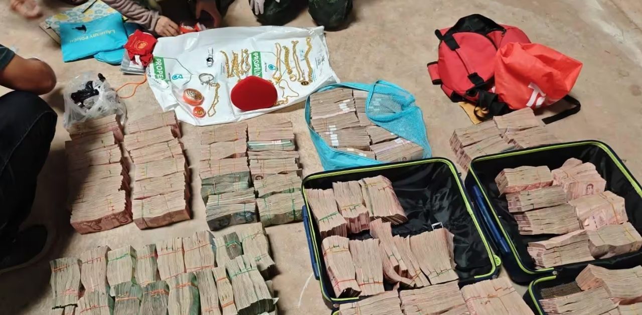Thai-Cambodian couple money cash seized at border warehouse