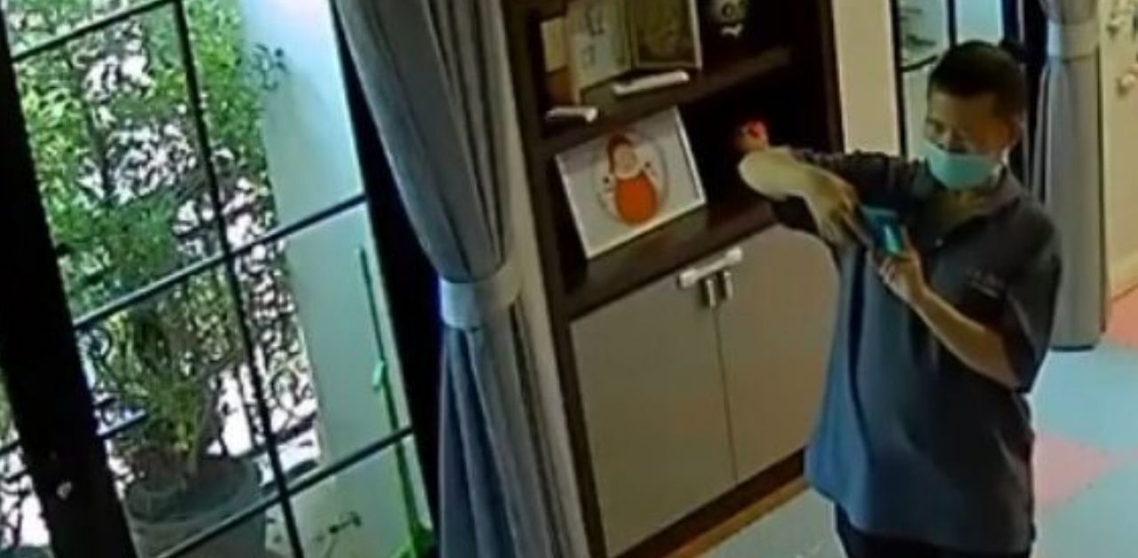 Thai maid pours disinfectant into child's milk bottle