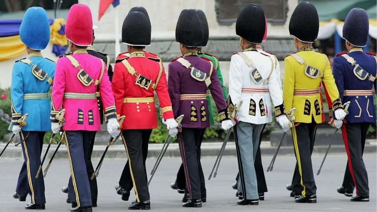 Thai royal guards showcase uniforms in various lucky colours representing different days of the week.