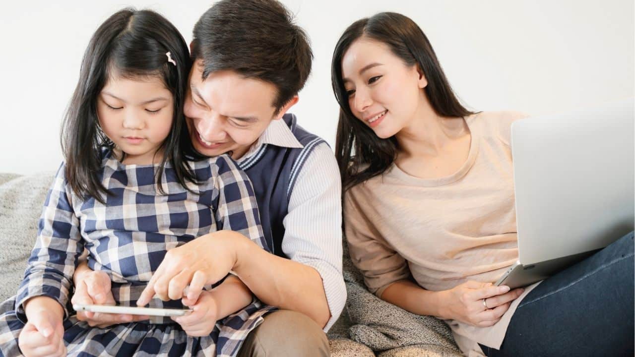 A parent and child discussing boarding school options in Thailand, reflecting on educational choices.