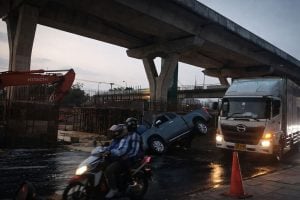 Rama 2 Road collapse overturns pickup truck in Bangkok | Thaiger