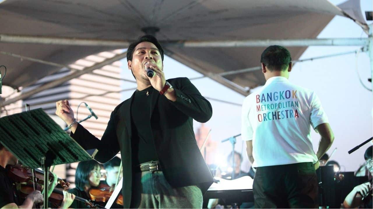 Contemporary bands performing at music in the park in Bangkok.