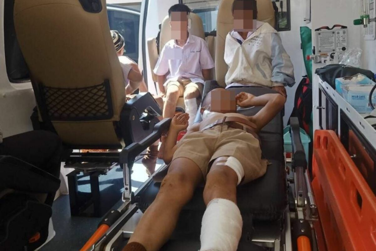 Injured students in emergency van after dog attack in Wang Nam Khiao