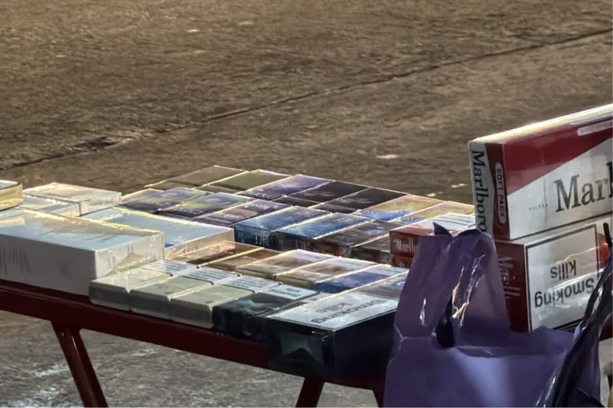 Vendor selling illegal sex products and cigarettes on Pattaya Beach Road