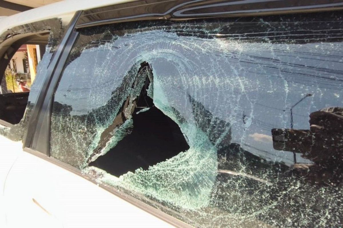 Car with shattered windows after rampage in Satun’s La-ngu district.