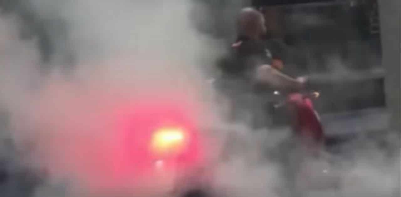 Foreign motorcyclist revs motorcycle engine in Phuket