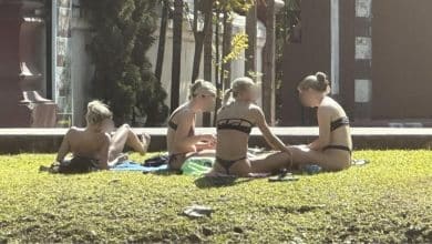 Opinions divided after foreigners sunbathe in bikinis near Chiang Mai temple | Thaiger