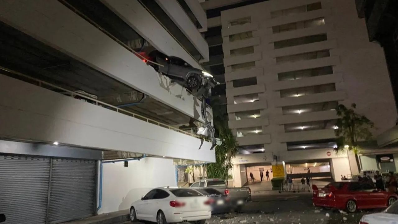 Driver survives nearly car plunge