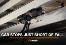 Thai driver escapes serious injury as SUV hangs off parking building | Thaiger