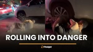 Foreign man seen rolling on Phuket street near EDC event | Thaiger